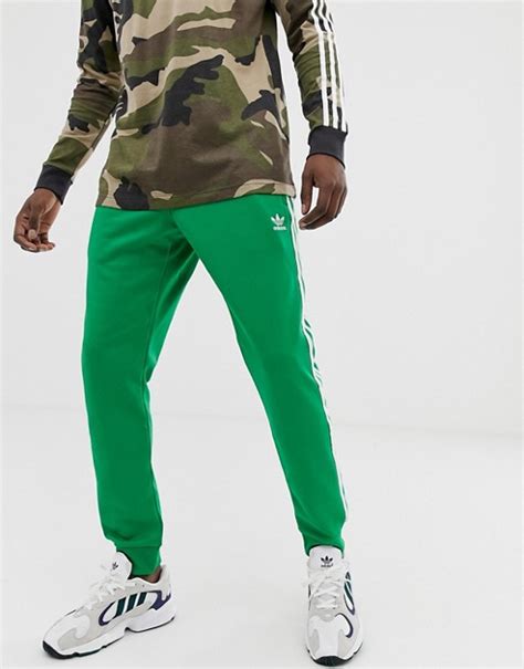 adidas jogginghose mit grüne streifen